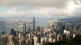 4k timelapse video of Hong Kong from day to night, zooming in