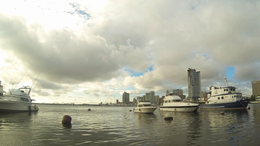 Timelapse of Manila bay with city skyline in the background
