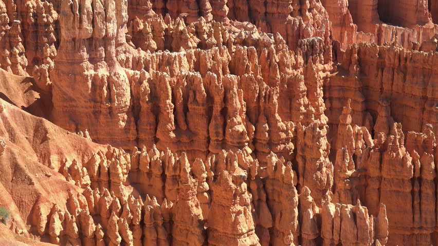 BRYCE CANYON, UTAH - JUN 2014: Bryce Canyon National Park Utah pan across valley. Red, orange, and white colors of the rocks provide spectacular views for park visitors. Designated in 1928.

