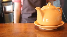 Barista Serving Cup Of Hot Tea, Stock Video