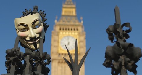 Revolution, Guy Fawkes mask and Big Ben.  Protest in  London June 2014, the Peoples Assembly that puts people and planet before profit.
