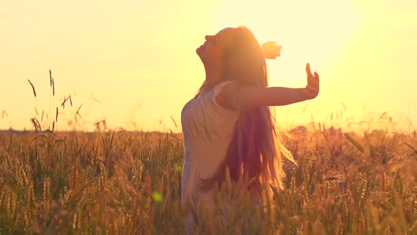 Beauty Girl with Healthy Long Hair Outdoors. Happy Smiling Young Woman Enjoying Nature on wheat field. Beautiful Pretty female having Fun in the Meadow. Freedom concept. Sunset. Slow motion 240 fps | Shutterstock HD Video #6761740