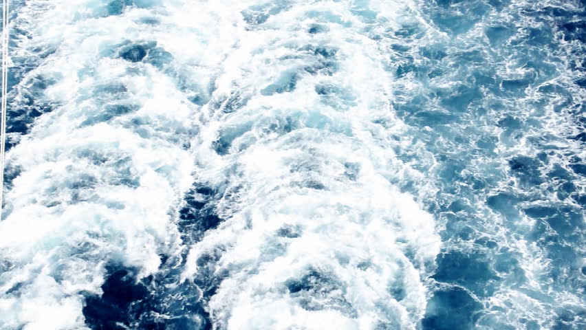The wake at the back of a cruise ship.