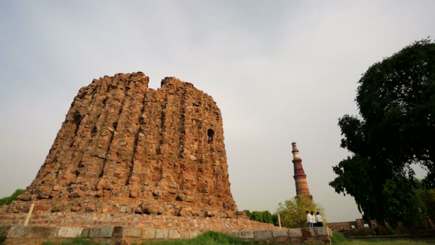 DELHI, INDIA - CIRCA MAY 2014: Qutub (Qutb) Minar, the tallest free-standing stone tower in the world, and the tallest minaret in India, constructed with red sandstone and marble in 1199 AD.