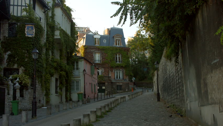 PARIS FRANCE- JULY 2, 2014: La Maison Rose is a restaurant in Montmartre that was the subject of a lithograph by Maurice Utrillo
