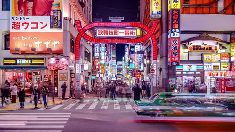 TOKYO, JAPAN - MARCH 14, 2014: Traffic in Kabuki-cho district of Shinjuku Ward. The area is a renown nightlife and red-light district.