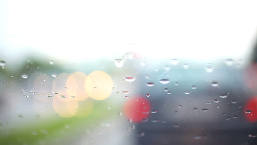 View from car on the rain and cars