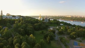 Aerial view of Kiev Pechersk Lavra, Kiev, Kyiv, Ukraine. Kyiv-Pechersk Lavra on a hill on the banks of Dnipro river. 1080 video footage