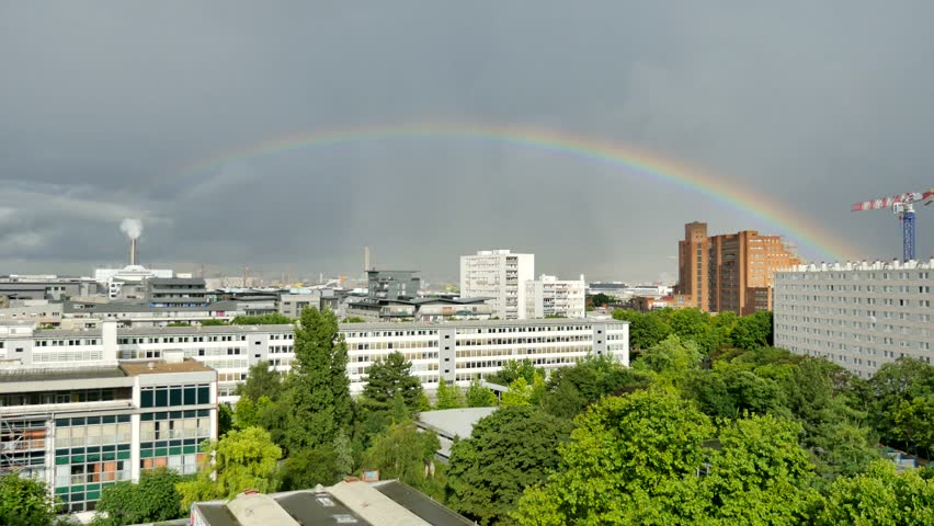 Rainbow over city in France