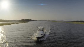 Awesome aerial view of a fishing boat, yacht at sunset off of beaufort south carolina.
Full HD stock video clip