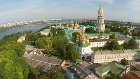 Aerial view of Kiev Pechersk Lavra, Kiev, Kyiv, Ukraine. Kyiv-Pechersk Lavra on a hill on the banks of Dnipro river. 1080 video footage