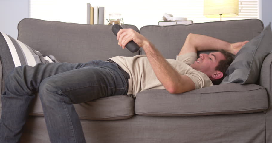 Guy trying to sleep on couch | Shutterstock HD Video #6826099