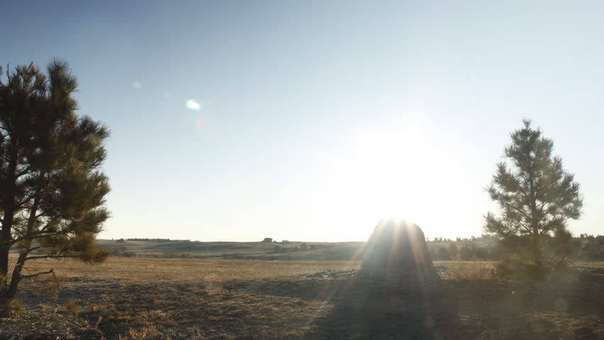 Time lapse of a brilliant sunrise in a meadow in Colorado. HD 1080p