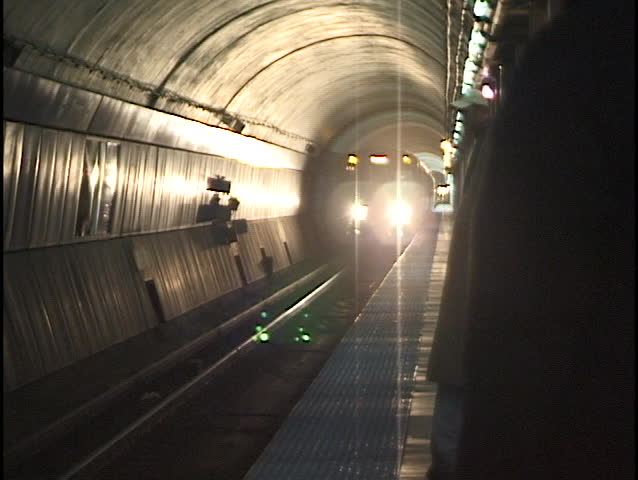 Subway Arrives at Station