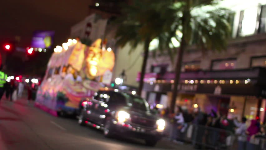 Defocused Mardi Gras parade on Canal Street in New Orleans, Louisiana.