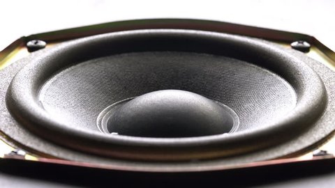 Close-up at moving sub-woofer. Speaker sub-woofer moving from loud music.
