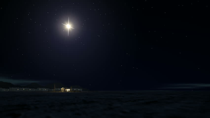 A slow zoom towards a depiction of the nativity scene of christs birth in bethlehem with the isolated run down stable being lit by a bright star