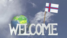 The word WELCOME in front of a turning globe and moving clouds in a blue sky with tooth pick and a small paper flag of FAROE ISLANDS