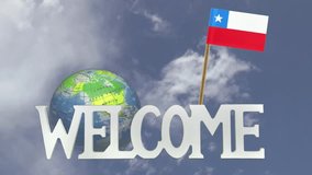 The word WELCOME in front of a turning globe and moving clouds in a blue sky with tooth pick and a small paper flag of CHILE