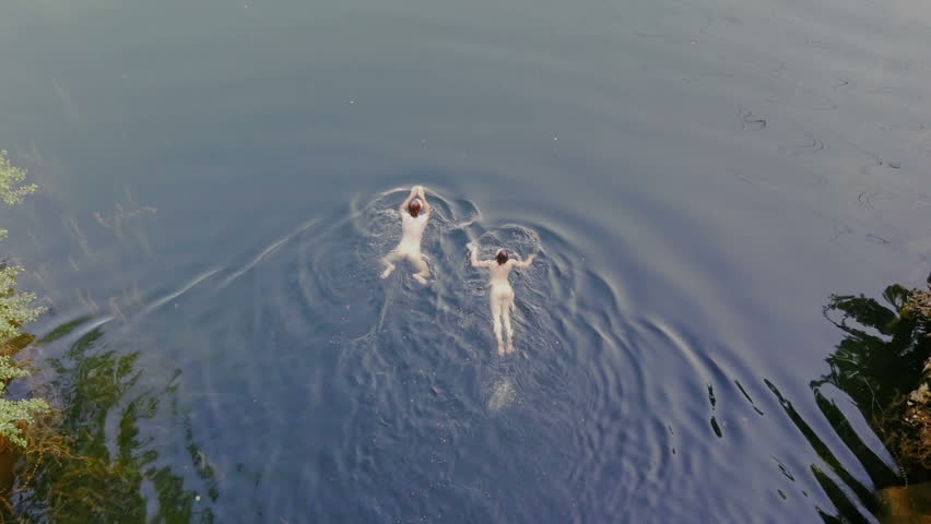 Naked Woman Swimming In Water