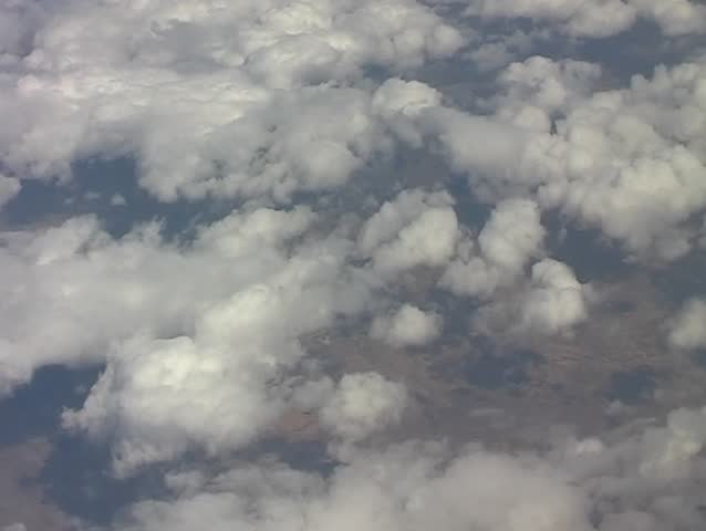 Airplane flight above the clouds