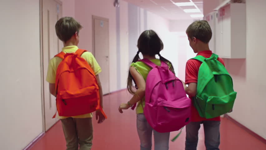 children with backpacks