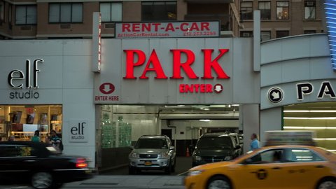 NEW YORK - JULY 22, 2014: parking garage on Broadway in Lower Manhattan, New York. Broadway is a major thoroughfare that runs north/south through Manhattan, New York City. 
