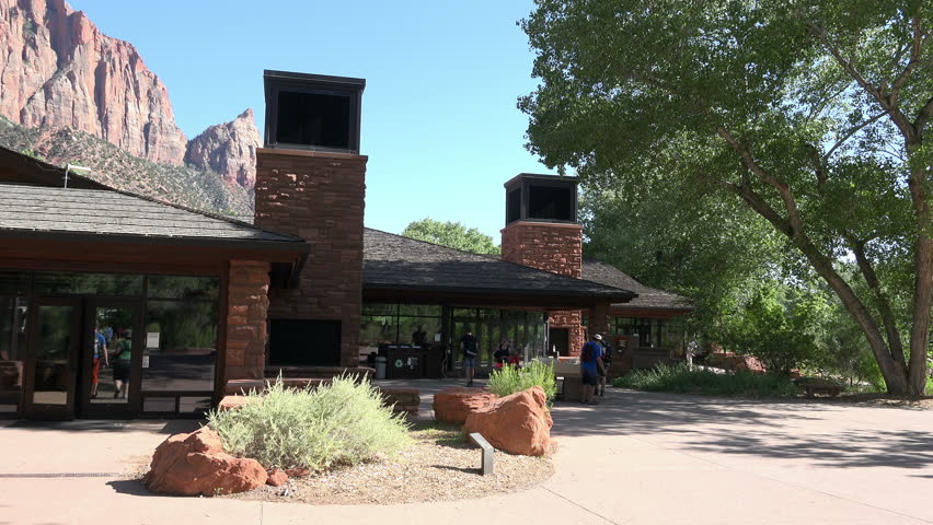ZION NATIONAL PARK, UTAH - JUN 2014: Zions National Park Utah visitor center. Famous natural red sandstone rock mountains. Located in Southwest Utah near St George and Springdale.