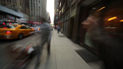 Hectic POV walk through busy Manhattan street in New York City NYC. Timelapse view.