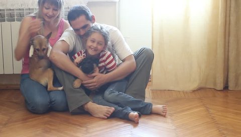happy young family with pets