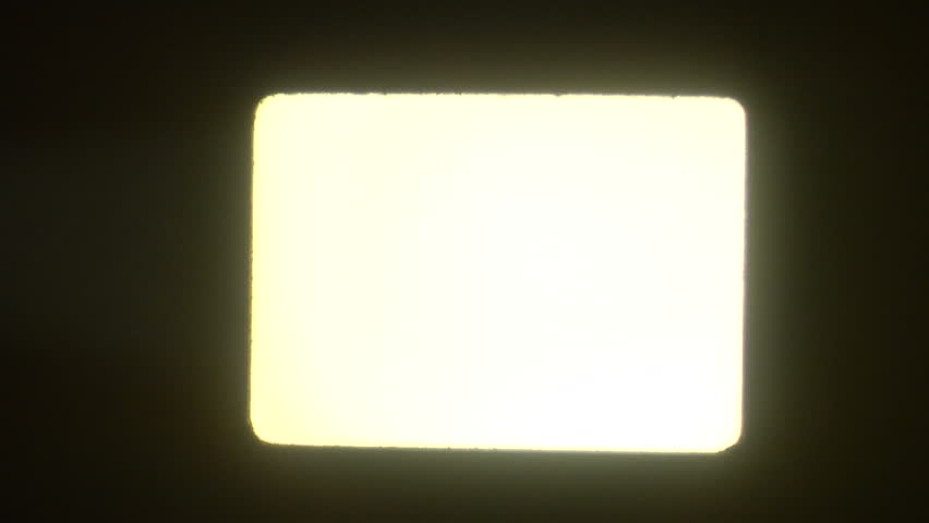 This is a blank white flickering frame from a 16mm projector running no film. 