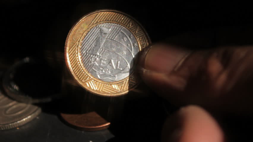 Brazilian Money - One Real Coin. Real is the present-day currency of Brazil. Its sign is R$.