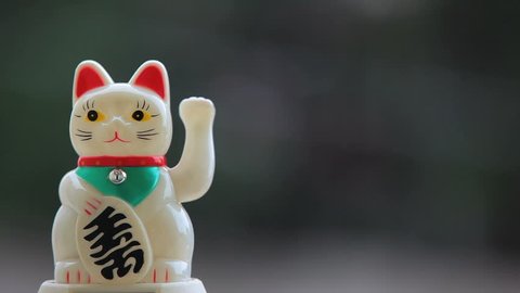 The maneki-neko, Beckoning cat - Japanese Lucky Charm