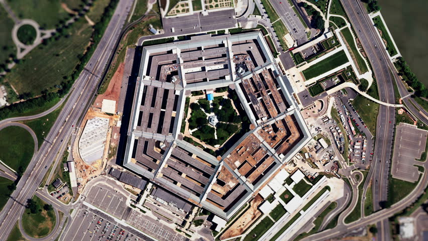 Satellite Zoom into U.S. Pentagon (24fps). A slow aerial zoom in on the United States Pentagon building in Arlington, Virginia, shot from a satellite perspective above with moving clouds and traffic.