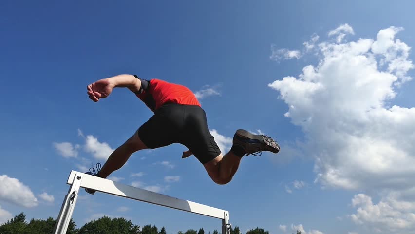 Hurdling in track and field in slow motion | Shutterstock HD Video #6946306