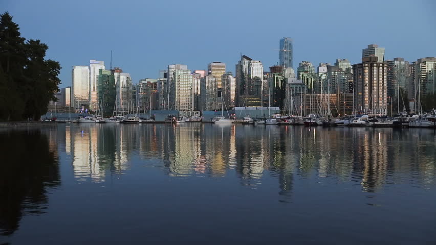 Twilight Vancouver Downtown, Coal Harbor. Looking across Coal Harbor at the Downtown Vancouver skyline at sunset.
