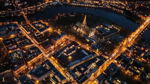   Aerial view over central Trondheim and Nidaorsdomen, in Trondheim Norway, at night.
