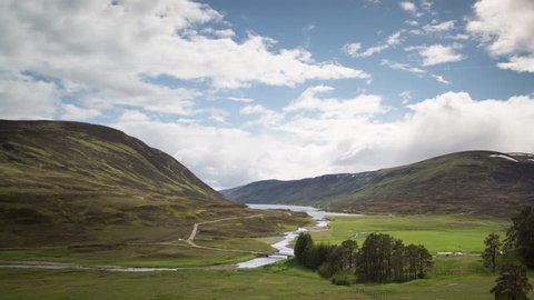 4k Timelapse of the beautiful loch maree and mountain landscape in the scottish highlands on a sunny day
