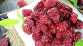 Heap of fresh rotating Raspberries (seamless loopable)