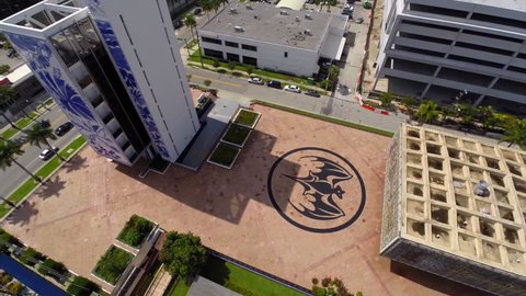 MIAMI - AUGUST 1: Aerial video of the former Bacardi Headquarters building in Miami with the Bacardi logo displayed as art in the complexes courtyard. 