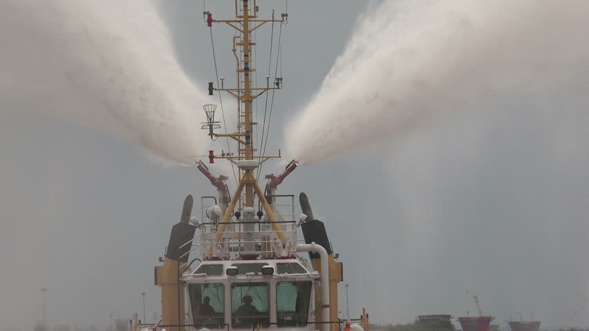 SAINT-PETERSBURG, RUSSIA - JUNE 30, 2014: Fire boat. Hose. Shot in 4K.