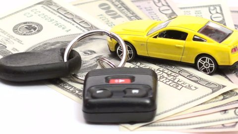 Car keys and model car on cash isolated on white seamless loop V3