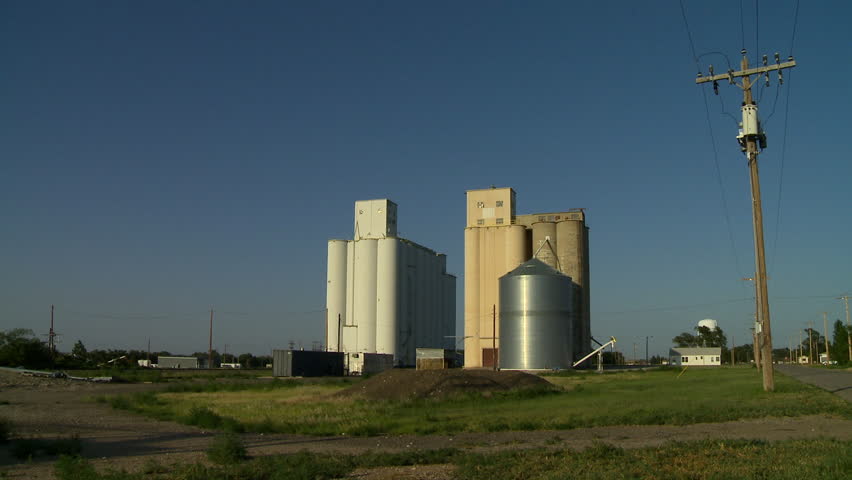 Grain elevators tower above a small town in western Kansas.
