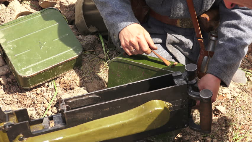 The soldier puts machine-gun tape in a drawer. The first world war. WWI. 1914-1918. Shot in 4K (ultra-high definition (UHD)), so you can easily crop, rotate and zoom, without losing quality! 