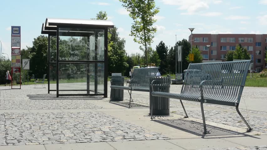bus stop in the city - house with nature in the background