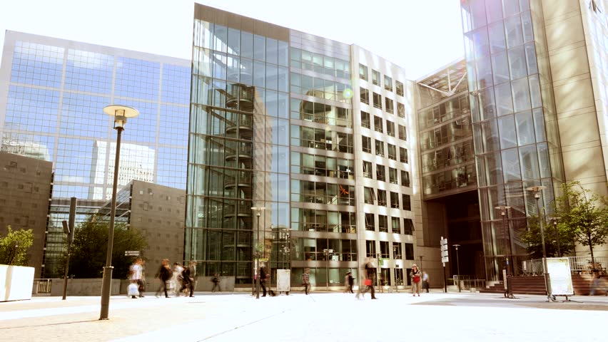 modern business district. urban city. company office. people walking background