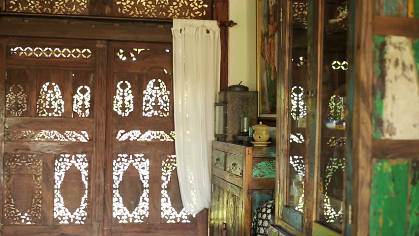 young beautiful couple visiting colonial furniture shop
