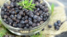 Portion of dried Juniper Berries (loopable full HD close-up video)