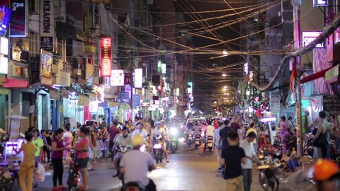 SAIGON, VIETNAM - MAY 2014: Nightlife with bars and pubs, Pham Ngu Lao Street