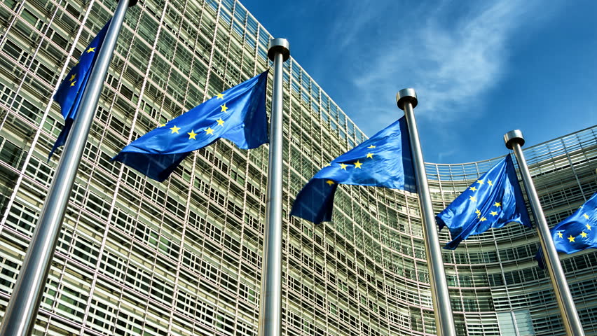 European Union flags waving in the wind in front of European Commission. Brussels, Belgium. 4K, Ultra High Definition, Ultra HD, UHD, 2160P, 3840 x 2160 Royalty-Free Stock Footage #6998119